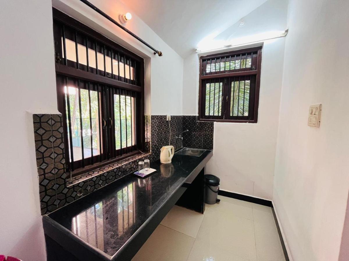 Naga Cottages Morjim Exterior foto