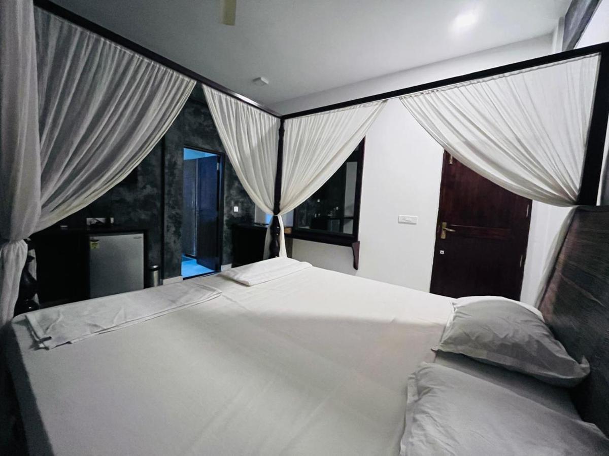 Naga Cottages Morjim Exterior foto