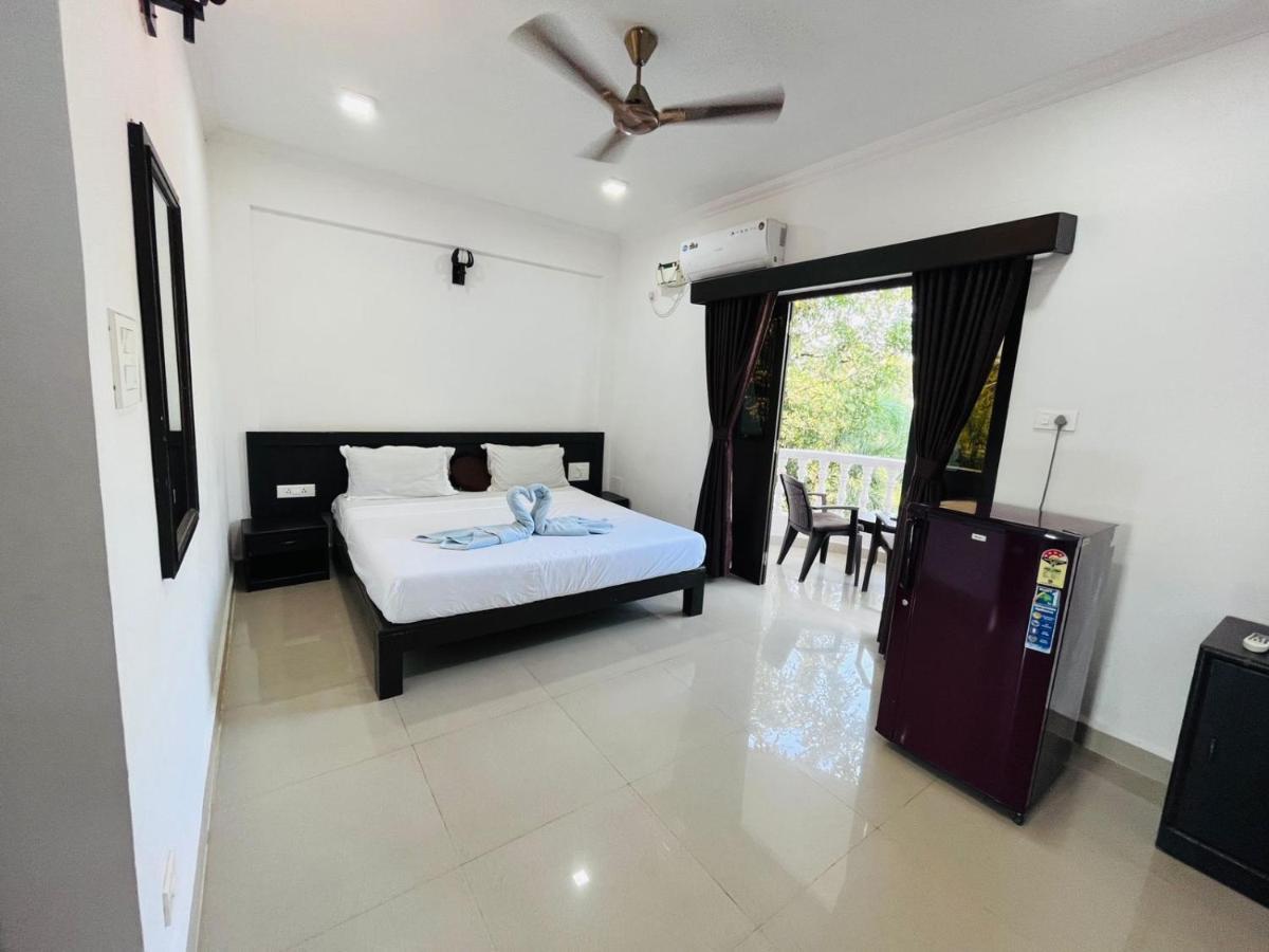 Naga Cottages Morjim Exterior foto