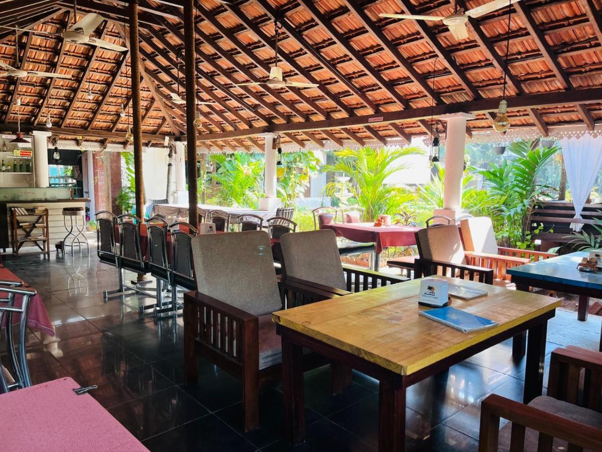 Naga Cottages Morjim Exterior foto