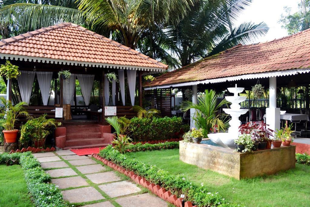 Naga Cottages Morjim Exterior foto